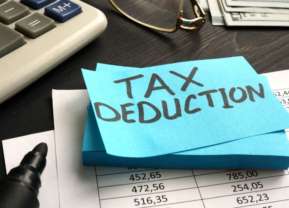 tax deduction options written on a piece of paper