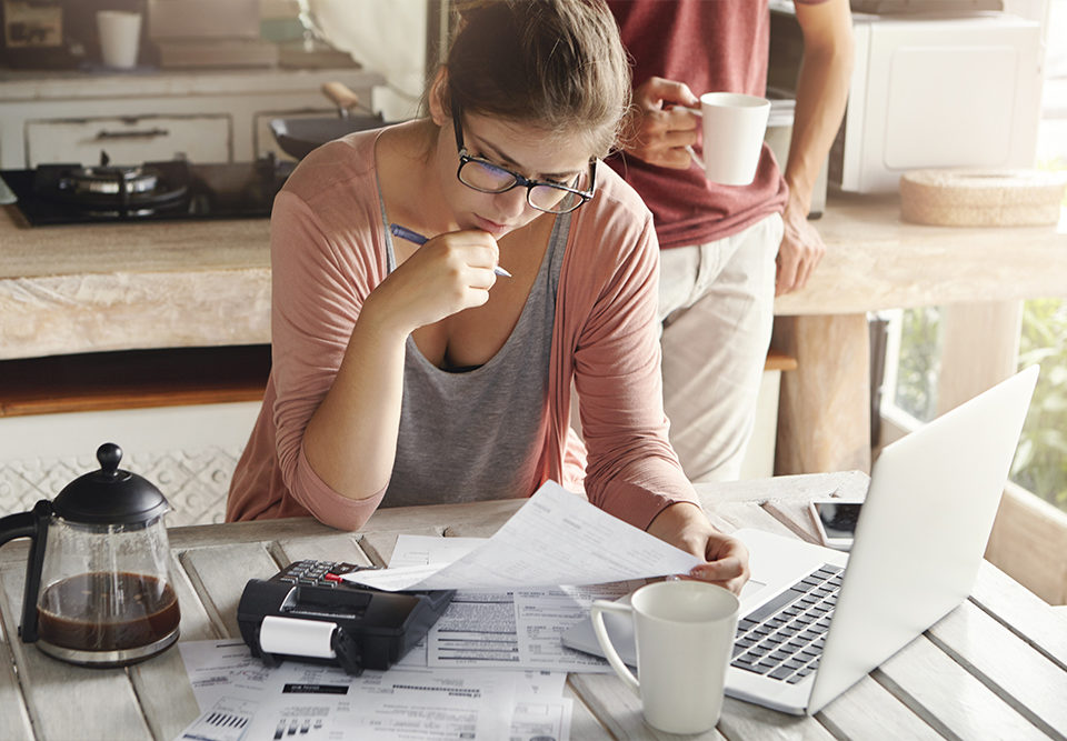woman with debt considers to sell structured settlement payments