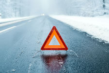 warning triangle due to poor winter road condition