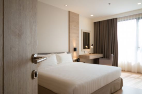 A view revealing a hotel bedroom, representing personal space and privacy rights in the context of legal protections.