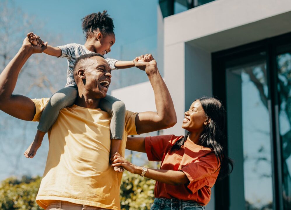 Happy family outdoors, symbolizing freedom and happiness from selling annuity payments for cash.