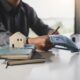 Reviewing mortgage payment options, considering selling annuity for a lump-sum payout to pay off a home loan.