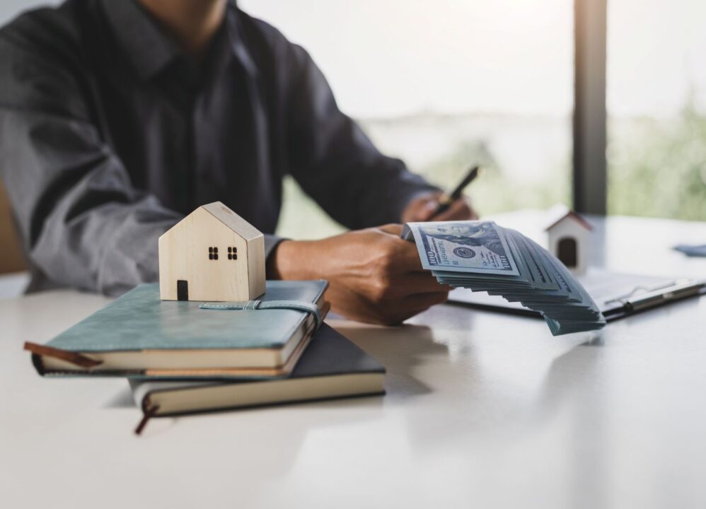 Reviewing mortgage payment options, considering selling annuity for a lump-sum payout to pay off a home loan.