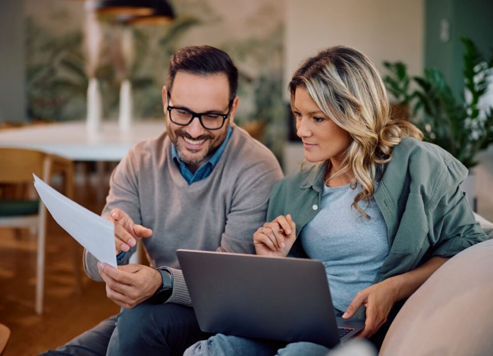 Happy family researching how to cash out an annuity from the comfort of their home.
